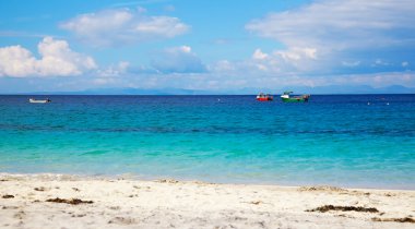 Fishing boats seen from Inisheer Island clipart