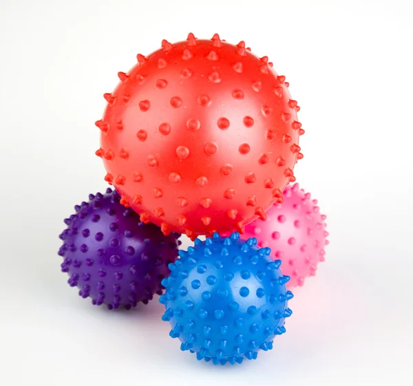 Bolas de juguete multicolor con alfileres — Foto de Stock