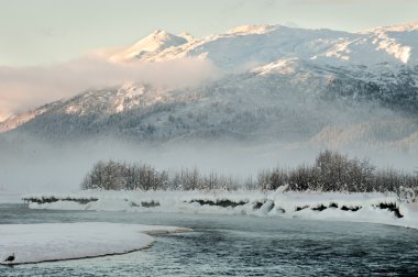 The Chilkat Valley under a covering of snow clipart