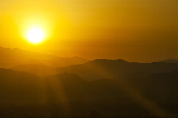 stock image Sunset behind mountains