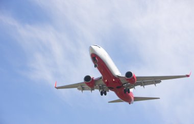 Boeing 737 makes its landing approach to oporto clipart