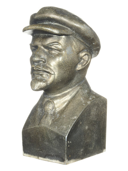 Old bronze bust of Lenin isolated on white background.