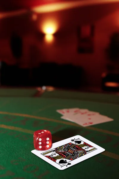 Dice with the jack of spades in the pack — Stock Photo, Image