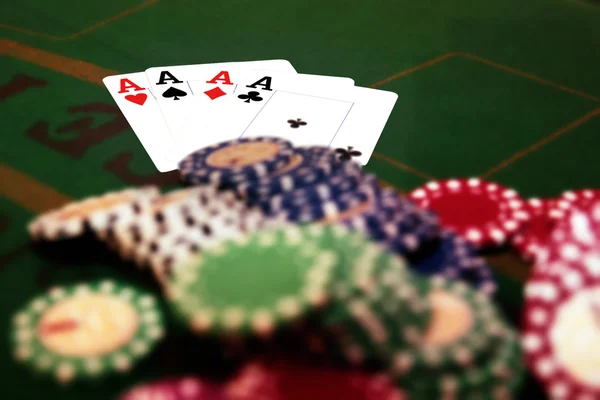 Four aces and a pile of chips — Stock Photo, Image