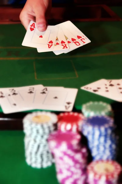 Poker player showing unbeatable royal flush — Stock Photo, Image