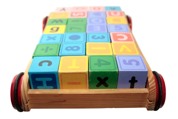 Childrens play letter blocks in cart with clipping path — Stock Photo, Image