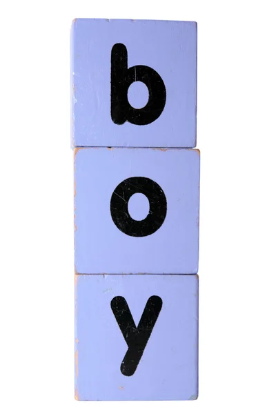 Мальчик в блоке букв с вырезкой путь — стоковое фото