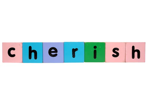 Schätzen in Spielzeug spielen Blockbuchstaben mit Clipping Pfad auf weiß — Stockfoto