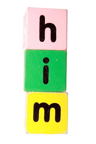 Him in play block letters with clipping path — Stock Photo, Image