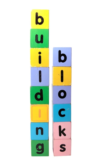Building blocks in letters upright — Stock Photo, Image