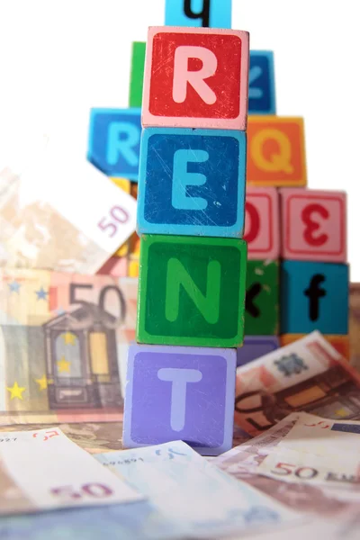 Rent money in toy blocks — Stock Photo, Image