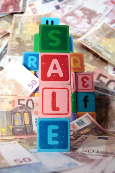 Sale in toy play block letters — Stock Photo, Image