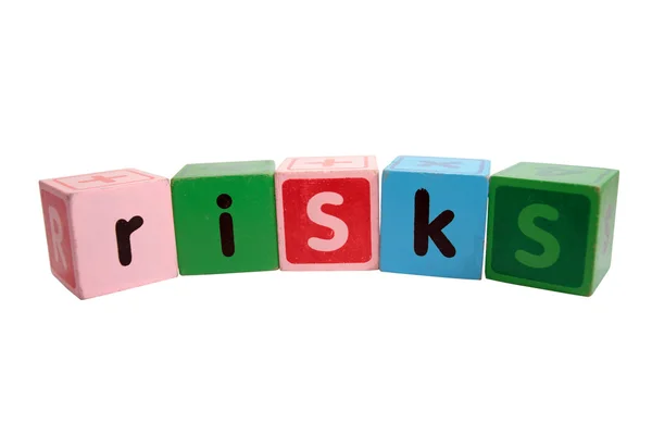 Risico's in speelgoed spelen blokken met uitknippad — Stockfoto