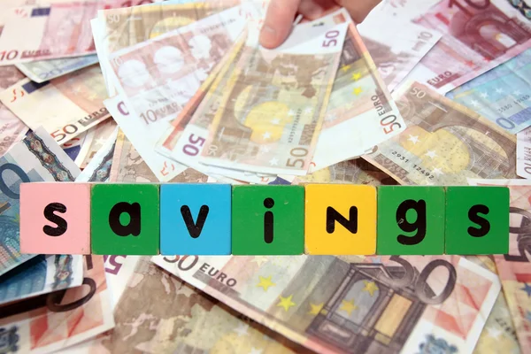 Euro poznámky úspory v dopisech hračky — Stock fotografie