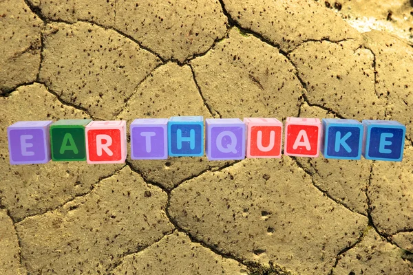 Earthquake in toy block letters — Stock Photo, Image