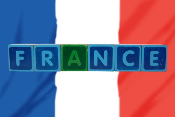 Γαλλία και σημαία με κεφαλαία γράμματα παιχνίδι — Φωτογραφία Αρχείου
