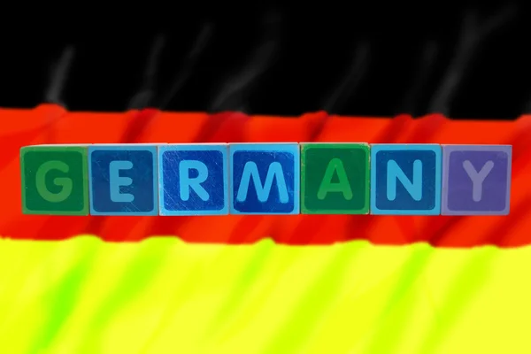 Duitsland en vlag in drukletters speelgoed — Stockfoto