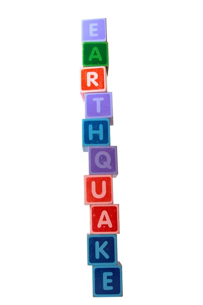 Terremoto em letras de brinquedo — Fotografia de Stock