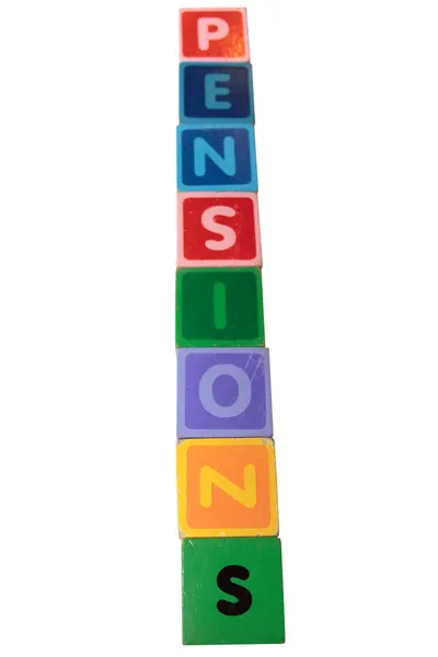 Pensões em letras de bloco de brinquedo de madeira — Fotografia de Stock