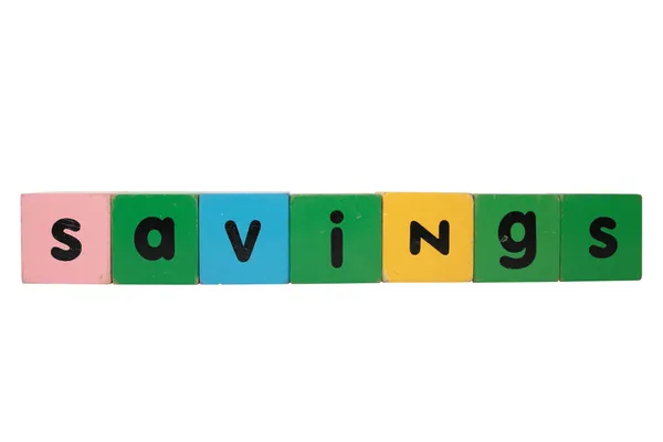 Savings in wooden toy block letters — Stock Photo, Image