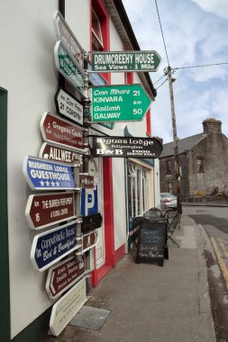 Irish road signs on path clipart