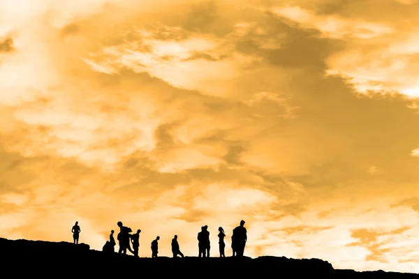 Silhouette of on peak of the cliff edge — Stock Photo, Image
