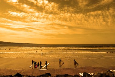Student surfers glorious sunset beach clipart