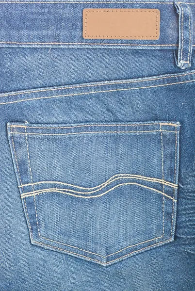 Blue denim with pocket and label — Stock Photo, Image