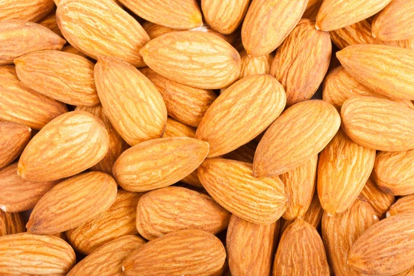 Whole almond nuts closeup — Stock Photo, Image