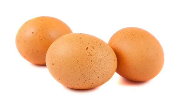 Tre uova di pollo marroni Foto Stock