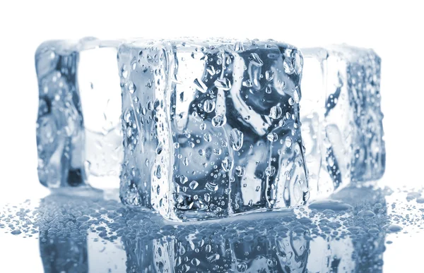 Three ice cubes with water drops Stock Picture