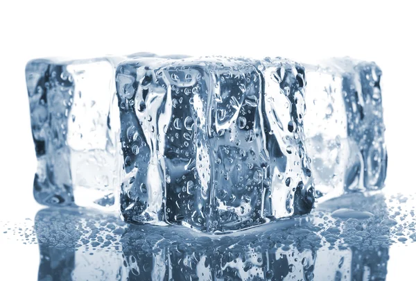 Three ice cubes with water drops Royalty Free Stock Photos