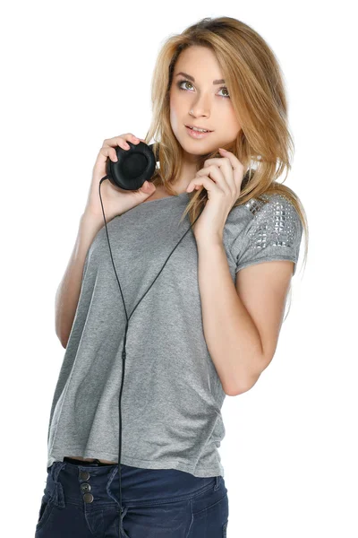Mooi meisje met koptelefoon — Stockfoto
