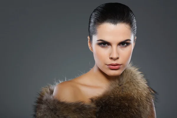 A photo of sexual beautiful girl is in fur clothes — Stock Photo, Image