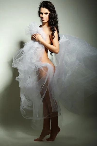 A beautiful young girl is in a bridal veil — Stock Photo, Image