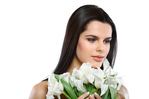 Vacker ung flicka med tulpaner, isolerad på en vit bakgrund — Stockfoto