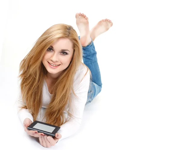 Beautiful white-headed girl, reading an e-book — Stock Photo, Image