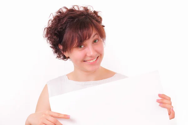 Menina bonita com uma folha de papel em branco — Fotografia de Stock