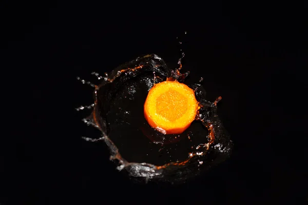 stock image Carrot and splashes of water