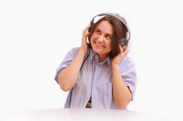 A young girl with headphones smiling — Stock Photo, Image