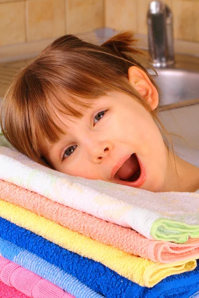 A little girl is happy with washing — Stock Photo, Image