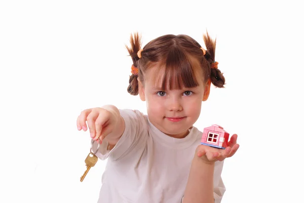 Κοριτσάκι να δίνει το κλειδί Φωτογραφία Αρχείου