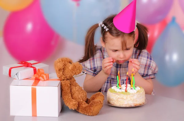 stock image Little girl preparing to blow out the candles