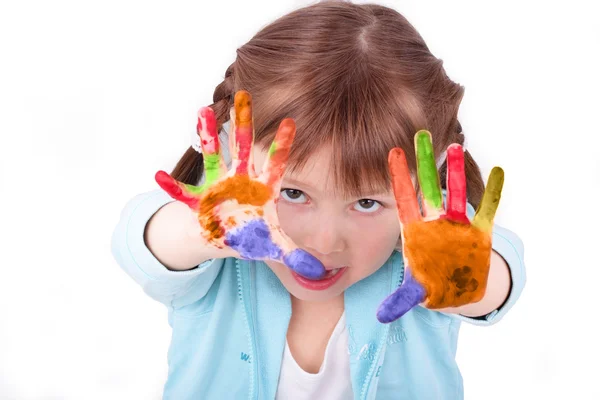 Kislány mutatja ki a színes kezét Stock Kép
