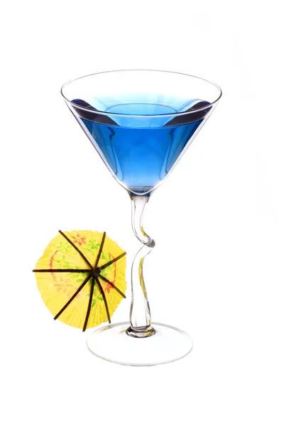 Wineglass are filled with blue beverage and cocktail umbrella — Stock Photo, Image
