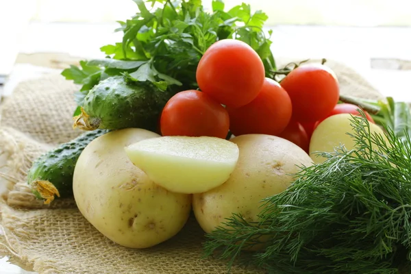 stock image Fresh new potatoes and vegetables