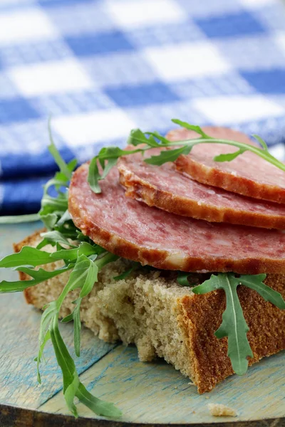 stock image Canapes with salami and arugula