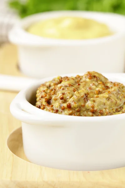 French mustard sauce in white gravy boat — Stock Photo, Image