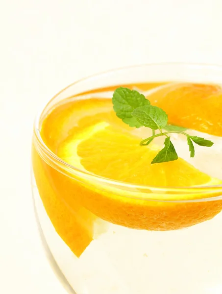 Fresh orange lemonade with mint leaves and ice — Stock Photo, Image