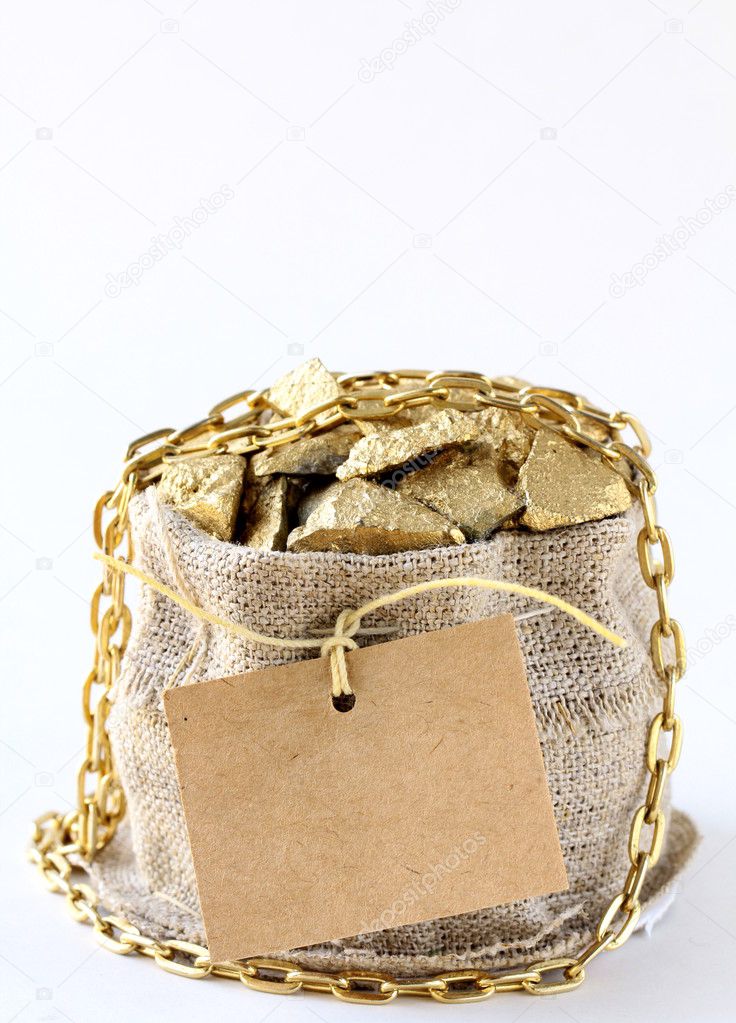 Gold nuggets on a small pouch